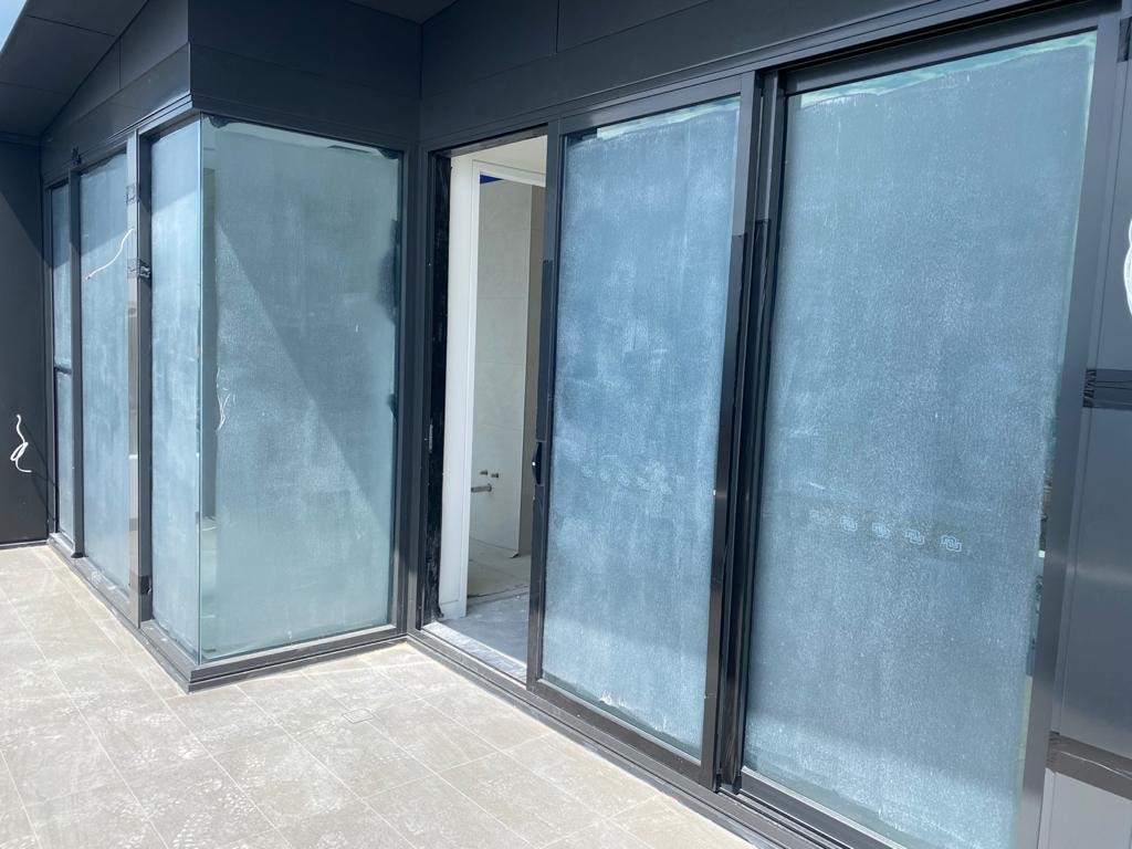 Glass and metal protection in Coogee